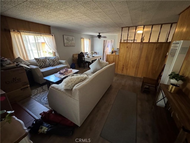 23789 Zuger, Crestline, CA 92325 - living area with wooden walls, dark wood-style floors, and ceiling fan