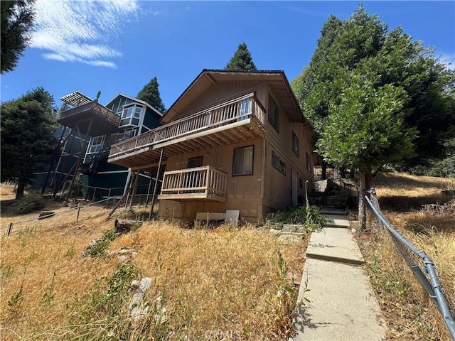 23789 Zuger, Crestline, CA 92325 - view of front of home with a wooden deck