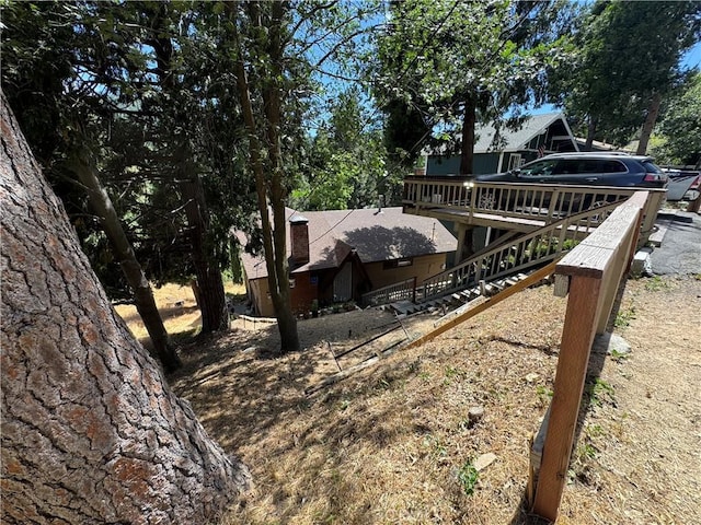 23789 Zuger, Crestline, CA 92325 - back of property featuring stairs