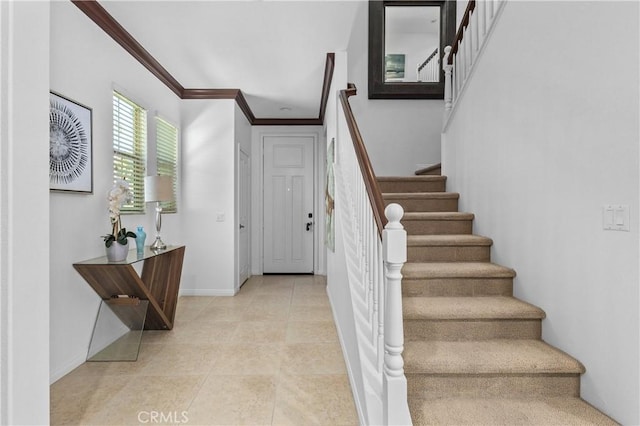 41 Keepsake, Irvine, CA 92618 - stairway featuring ornamental molding and tile patterned flooring