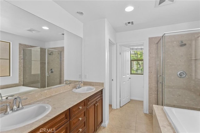 41 Keepsake, Irvine, CA 92618 - bathroom with a bath, tile patterned flooring, double vanity, a stall shower, and recessed lighting