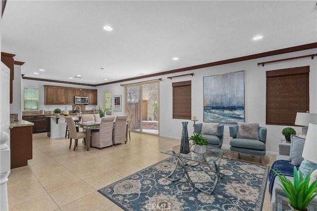 41 Keepsake, Irvine, CA 92618 - living room featuring crown molding, recessed lighting, plenty of natural light, and light tile patterned floors
