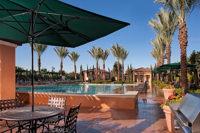 41 Keepsake, Irvine, CA 92618 - view of swimming pool with grilling area and a patio