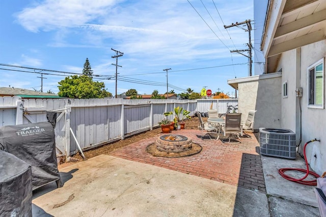 552 Emory St, Imperial Beach, CA 91932 - fenced backyard featuring a fire pit, a patio area, and outdoor dining area
