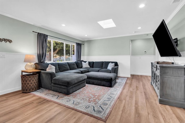 552 Emory St, Imperial Beach, CA 91932 - living room featuring a skylight, ornamental molding, wainscoting, light wood finished floors, and recessed lighting