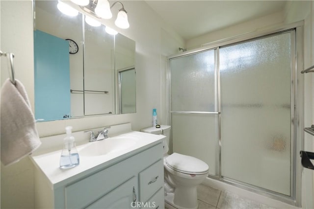 24561 Sinaloa St, Moreno Valley, CA 92557 - full bath featuring vanity, tile patterned floors, and a shower with door