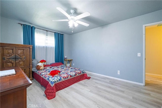 24561 Sinaloa St, Moreno Valley, CA 92557 - bedroom with light wood-style flooring and ceiling fan
