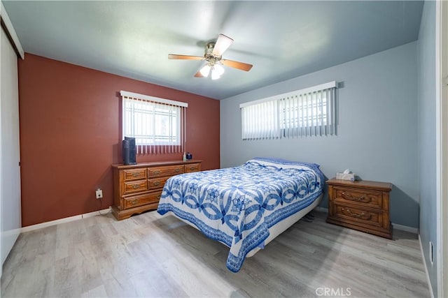 24561 Sinaloa St, Moreno Valley, CA 92557 - bedroom with light wood-style floors and ceiling fan