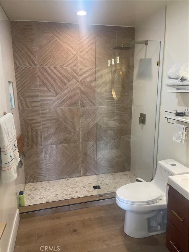 1192 Mitchell Unit 7, Tustin, CA 92780 - full bathroom with a tile shower, vanity, and wood finished floors