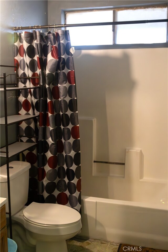 895 Garner Ave, San Bernardino, CA 92411 - bathroom featuring shower / bath combo and vanity