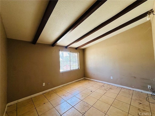 27331 Perkins Rd, Madera, CA 93637 - unfurnished room with light tile patterned flooring and a textured ceiling