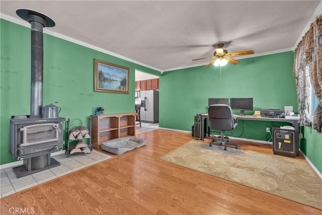 36227 Montezuma Valley Rd, Ranchita, CA 92066 - office space with a wood stove, crown molding, a ceiling fan, and wood finished floors