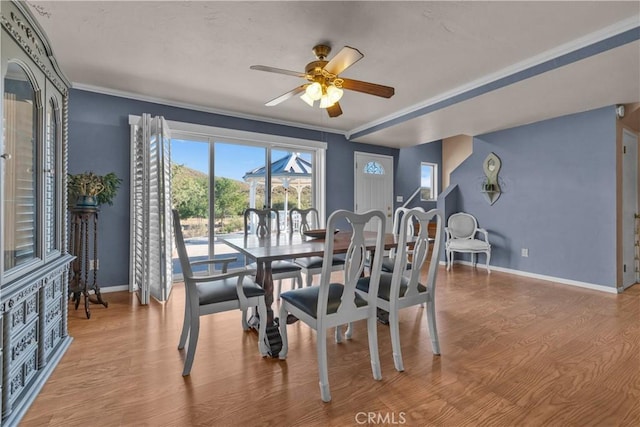 36227 Montezuma Valley Rd, Ranchita, CA 92066 - dining space featuring a ceiling fan, wood finished floors, and crown molding