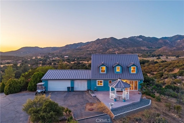 36227 Montezuma Valley Rd, Ranchita, CA 92066 - view of front of home featuring a mountain view, driveway, a standing seam roof, and a metal roof