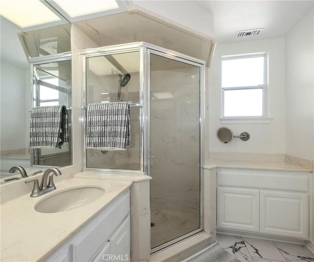 40620 Via Ranchitos, Fallbrook, CA 92028 - bathroom with vanity, a stall shower, and marble look tiles