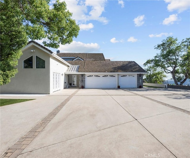 40620 Via Ranchitos, Fallbrook, CA 92028 - view of front of house with driveway, a garage, and stucco siding