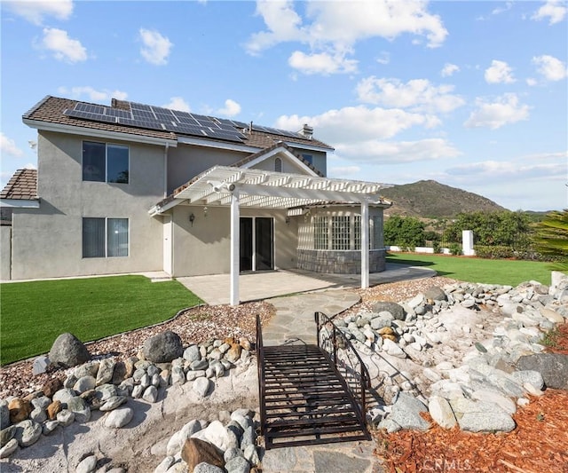 40620 Via Ranchitos, Fallbrook, CA 92028 - back of property with a pergola, a patio area, stucco siding, a yard, and a mountain view