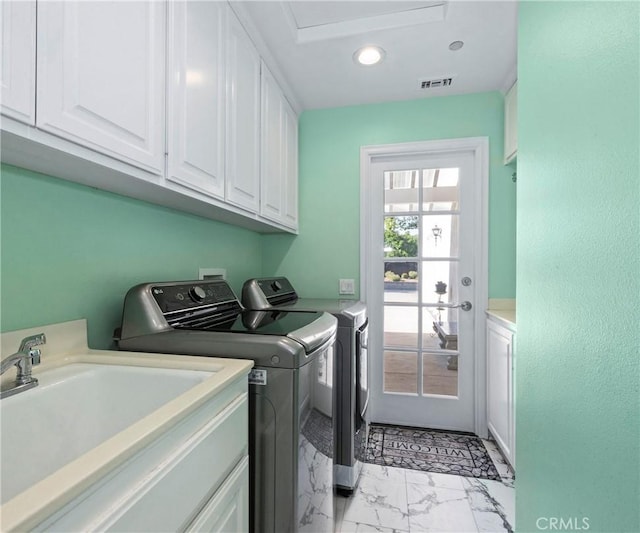 40620 Via Ranchitos, Fallbrook, CA 92028 - washroom with cabinet space, washing machine and clothes dryer, light marble finish floors, and recessed lighting