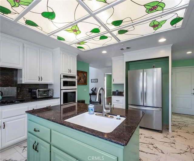 40620 Via Ranchitos, Fallbrook, CA 92028 - kitchen featuring freestanding refrigerator, white double oven, light marble finish floors, white cabinetry, and recessed lighting