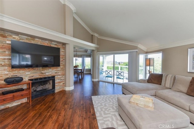 38 Toulon, Laguna Niguel, CA 92677 - living room with dark wood finished floors, lofted ceiling, a fireplace, and ornamental molding