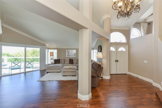 38 Toulon, Laguna Niguel, CA 92677 - entryway with high vaulted ceiling, wood finished floors, a chandelier, and ornamental molding