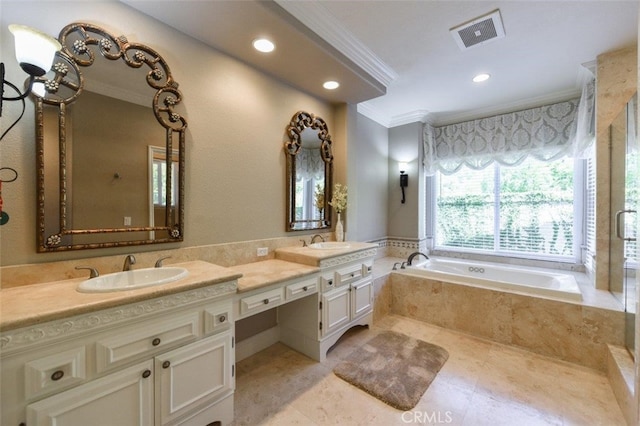 38 Toulon, Laguna Niguel, CA 92677 - full bathroom featuring ornamental molding, double vanity, a garden tub, and recessed lighting
