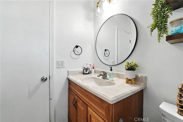 9562 Locust Ave, Fontana, CA 92335 - bathroom featuring vanity and toilet