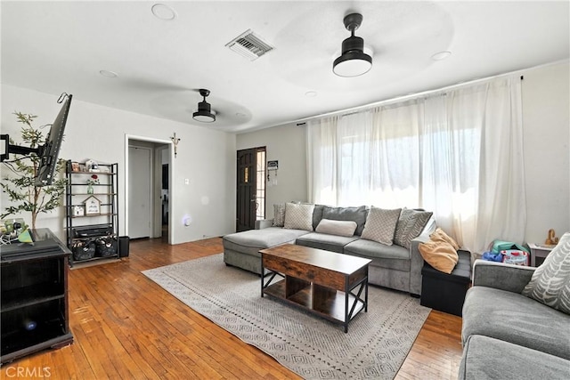 9562 Locust Ave, Fontana, CA 92335 - living room featuring a ceiling fan and wood-type flooring