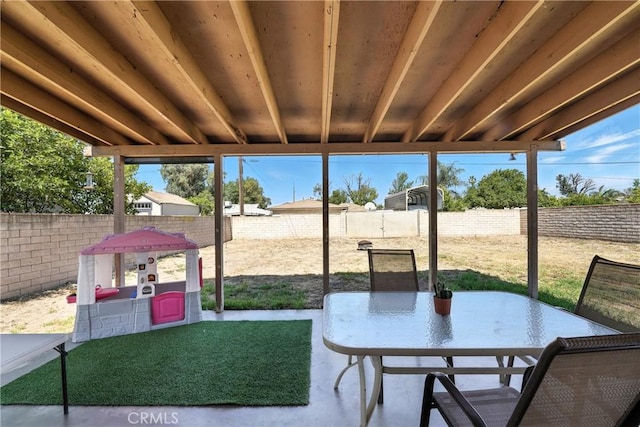 9562 Locust Ave, Fontana, CA 92335 - fenced backyard featuring outdoor dining space and a patio