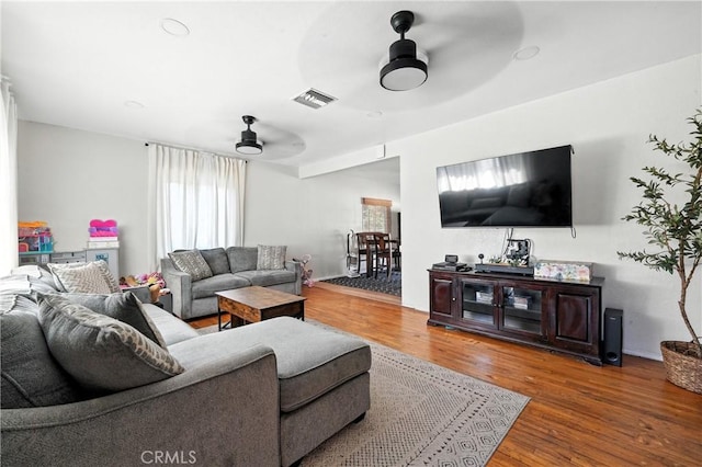 9562 Locust Ave, Fontana, CA 92335 - living area featuring ceiling fan and wood finished floors