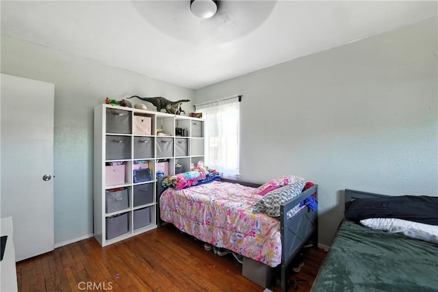 9562 Locust Ave, Fontana, CA 92335 - bedroom with hardwood / wood-style floors