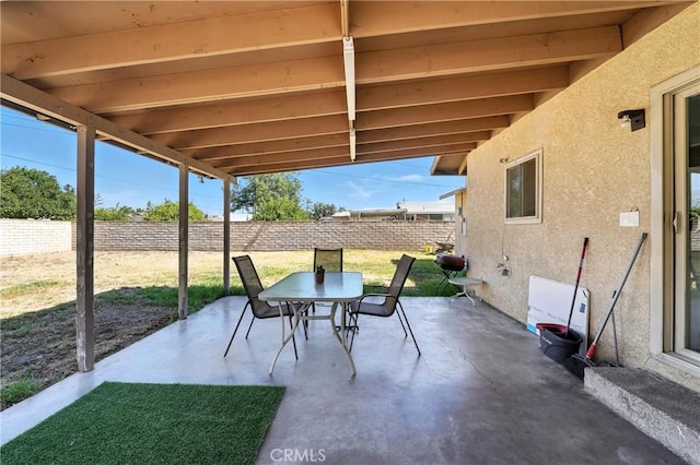 9562 Locust Ave, Fontana, CA 92335 - fenced backyard featuring a patio and outdoor dining area