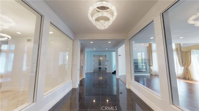 22500 N Summit Ridge Cir, Chatsworth, CA 91311 - hallway featuring a chandelier and recessed lighting