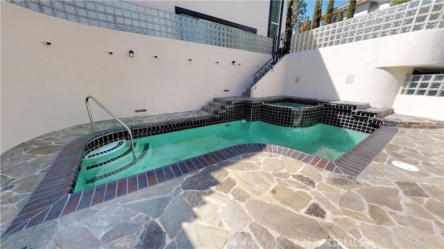 22500 N Summit Ridge Cir, Chatsworth, CA 91311 - view of pool featuring a pool with connected hot tub and a patio
