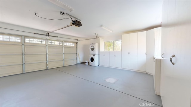 22500 N Summit Ridge Cir, Chatsworth, CA 91311 - garage featuring estacked washer and dryer and a garage door opener