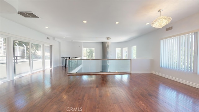 22500 N Summit Ridge Cir, Chatsworth, CA 91311 - empty room featuring wood-type flooring and recessed lighting