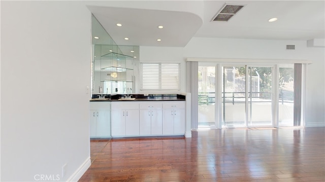 22500 N Summit Ridge Cir, Chatsworth, CA 91311 - bar area featuring wood-type flooring and recessed lighting