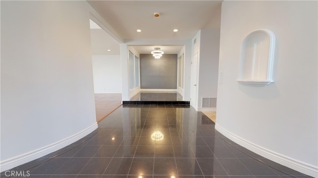 22500 N Summit Ridge Cir, Chatsworth, CA 91311 - hallway with granite tiled floors and recessed lighting