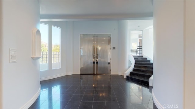 22500 N Summit Ridge Cir, Chatsworth, CA 91311 - entryway featuring baseboards