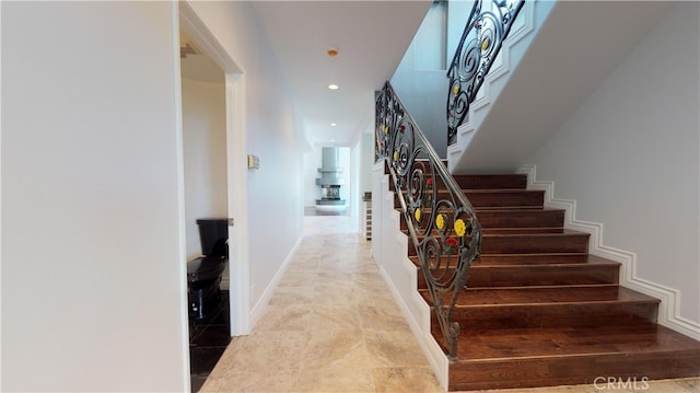 22500 N Summit Ridge Cir, Chatsworth, CA 91311 - staircase with recessed lighting and baseboards