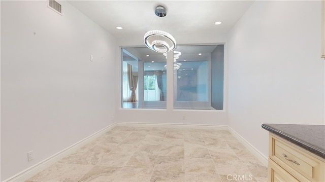 22500 N Summit Ridge Cir, Chatsworth, CA 91311 - unfurnished dining area with a chandelier and baseboards