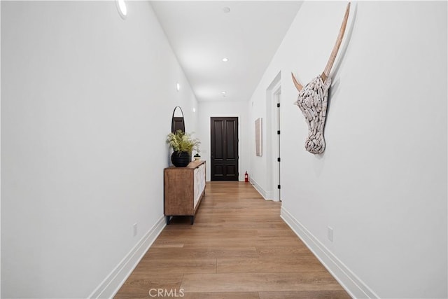 101 Lustro, Irvine, CA 92602 - hallway with light wood finished floors and recessed lighting