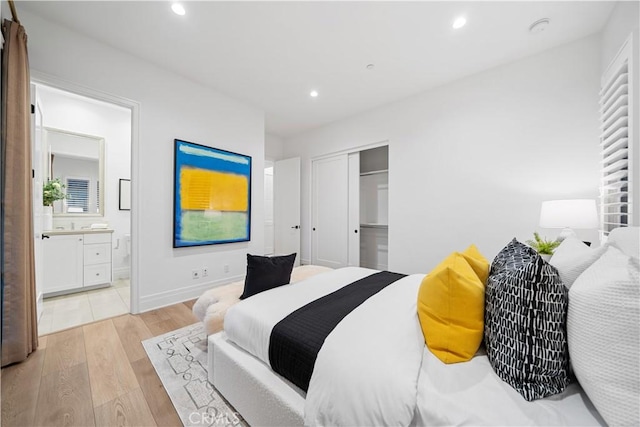 101 Lustro, Irvine, CA 92602 - bedroom with light wood-style floors, recessed lighting, a closet, and ensuite bath