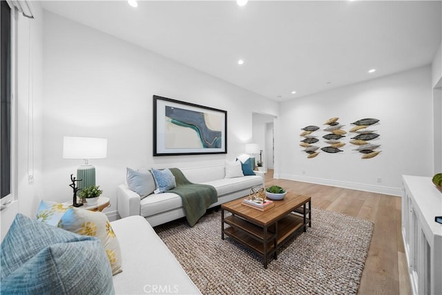 101 Lustro, Irvine, CA 92602 - living room featuring light wood-type flooring and recessed lighting