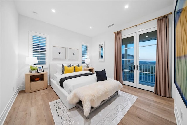 101 Lustro, Irvine, CA 92602 - bedroom featuring access to outside, light wood finished floors, french doors, and recessed lighting