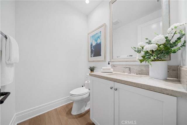 101 Lustro, Irvine, CA 92602 - half bathroom with vanity and wood finished floors