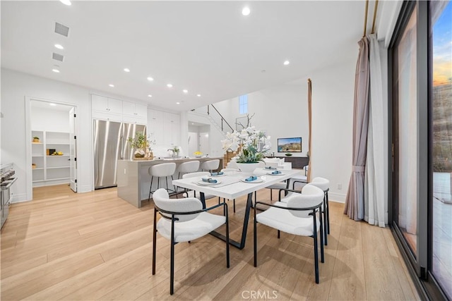 101 Lustro, Irvine, CA 92602 - dining room featuring light wood finished floors and recessed lighting