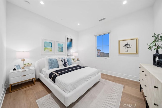 101 Lustro, Irvine, CA 92602 - bedroom with light wood-style floors and recessed lighting