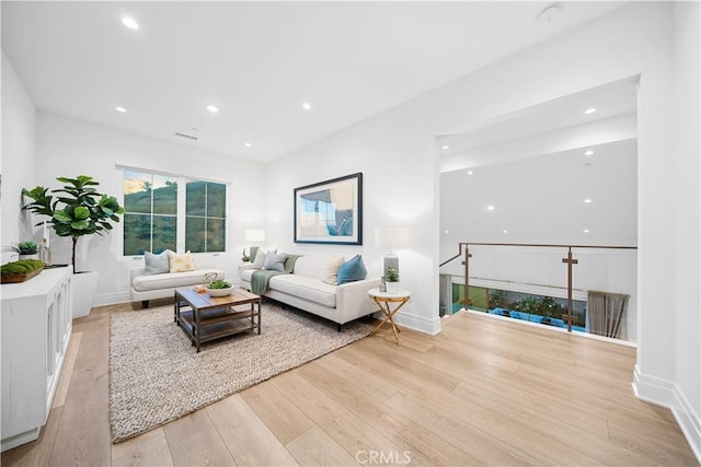 101 Lustro, Irvine, CA 92602 - living area with light wood finished floors and recessed lighting