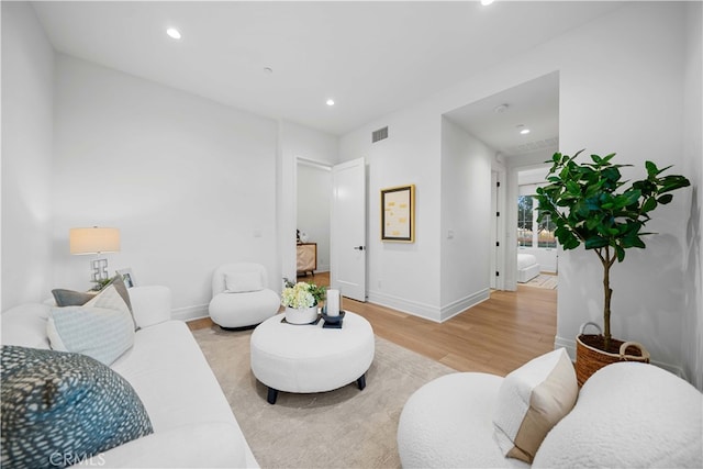 101 Lustro, Irvine, CA 92602 - living room featuring light wood finished floors and recessed lighting